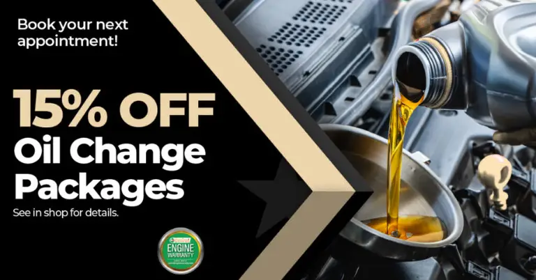 Automotive Repair & Tire Shop Oakville, ON - Sil’s Auto Care Centre A promotional banner shows motor oil being poured into a car engine, offering 15% off oil change packages with a Free Battery Test with Diagnostic Report. A badge highlights a limited engine warranty. See shop for details. | Call Us Today At +1 (905) 823-2626